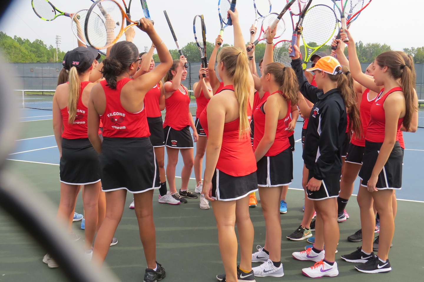 The Niagara-Wheatfield girls tennis team prepares before a match vs. Lewiston-Porter.